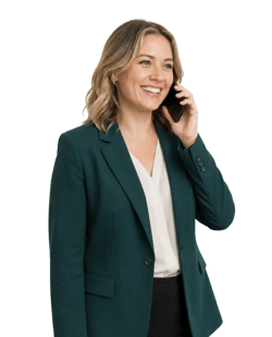 smiling-businesswoman-on-phone-green-blazer