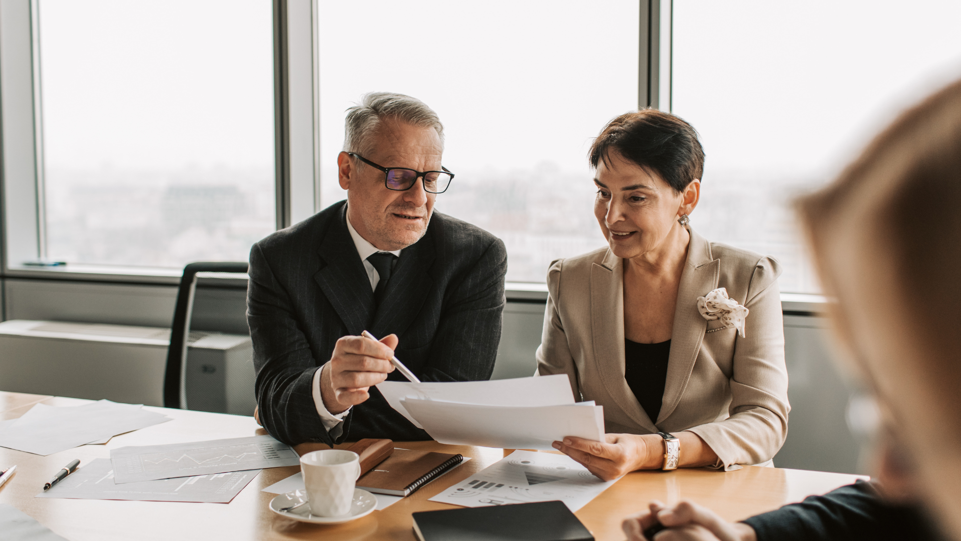 Clients discussing succession planning with an advisor Clients discussing succession planning with an advisor