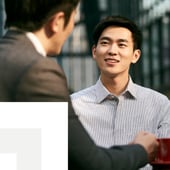 A business conversation between two workers