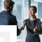 A handshake in a business meeting