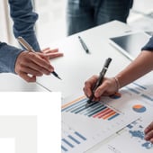 Business people analyzing charts