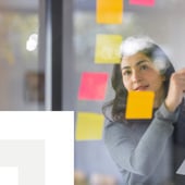 Businesswoman using postits