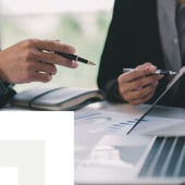 Hands reviewing documents