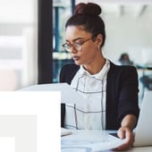 Businesswoman reading documents