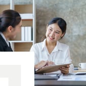 Businesswoman revieiwng tablet
