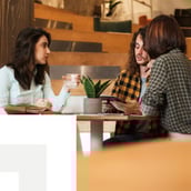business meeting discussion over coffee