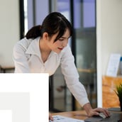 Businesswoman working on documents