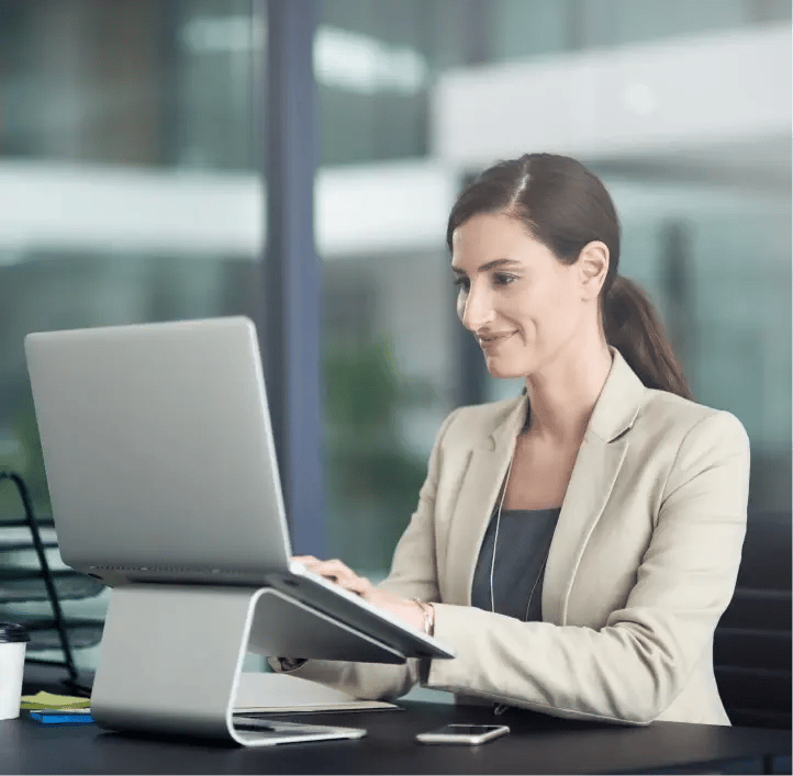 Businesswoman working on a laptop in the office