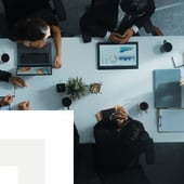 Professionals working at a business desk