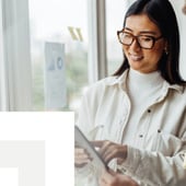 Businesswoman reviewing documents