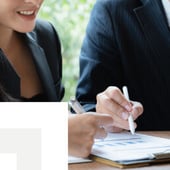 Businesswoman reviewing documents