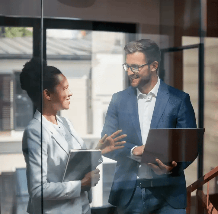 Businesswoman and businessman having a discussion