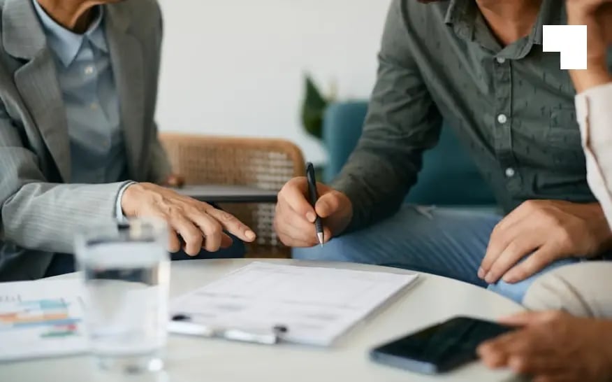 Business professionals reviewing ISIN registration documents for securities listing services