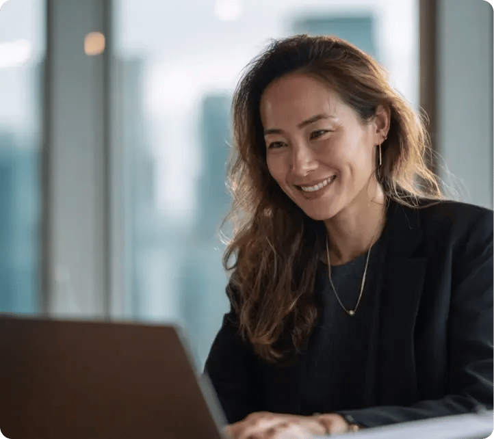 two_hong_kong_chinese_professionals_reviewing_a_2026_hr_account_portal_dashboard_showing_employee_records_payroll_summary_and_mpf_contribution_status_on_a_laptop_at_a_bright_modern_office_desk_orange_